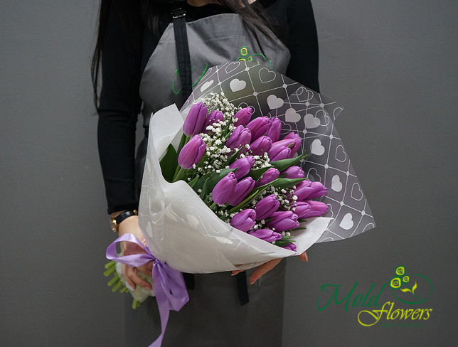 Bouquet with purple tulips and gypsophila photo
